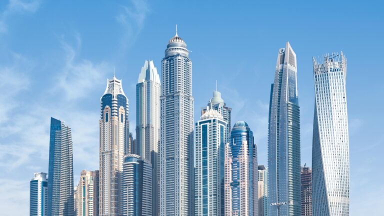 Stunning view of Dubai's iconic skyscrapers under a clear blue sky.